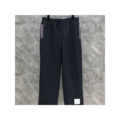 THOM BROWN LOGO PATCH RIPSTOP TRACK PANTS - 톰브라운 로고 패치 립스톱 트랙팬츠